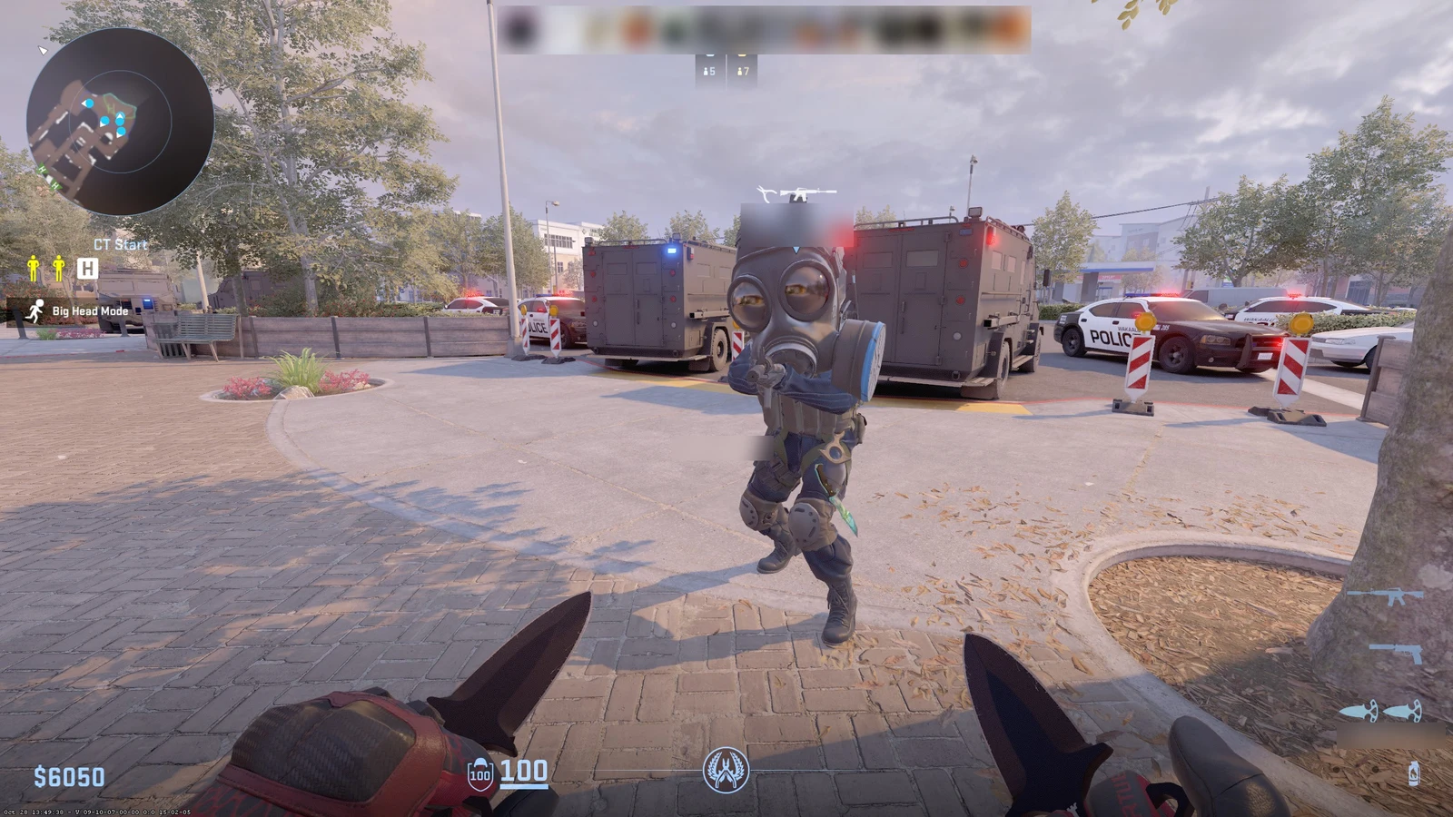 A CT agent with an oversized gas mask head in CS2 Big Head Mode